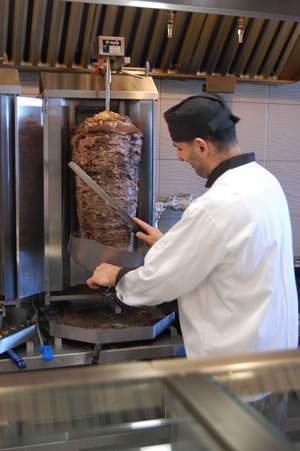 Slicing beef at Ottawa Shawarma